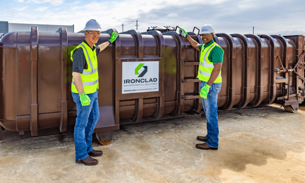 An image of Ironclad Environmental's team members standing in front of their equipment.