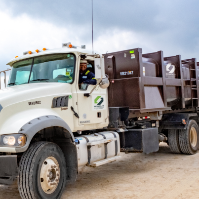 vacuum boxes being transported by a truck